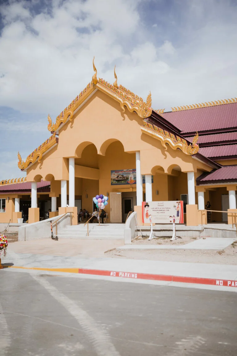 Engaging with Wat Lao Salt Lake Buddharam's intercultural programs.